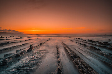 Sunset in Sakoneta is a beach in Deba. It is the western end of the Basque Coast Geopark, Guipuzkoa. Basque Country