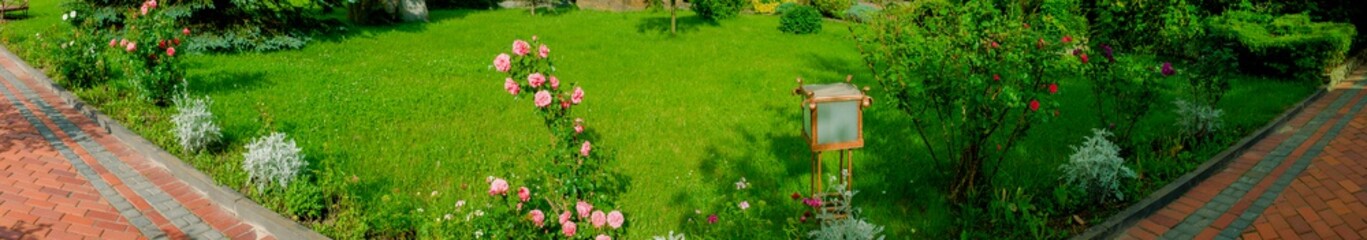 Park in spring - panoramic view, flowers