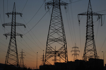Power line against the setting sun
