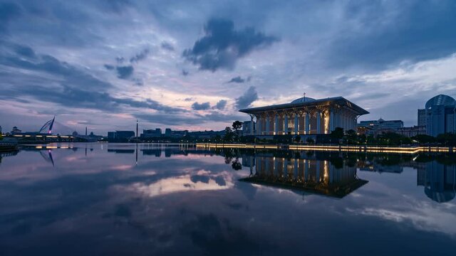 4K Dramatic sunrise timelapse during blue hour at the iron mosque or also known as Tuanku Mizan Zainal Abidin by the lake at Putrajaya, Malaysia.
H
