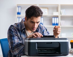 Hardware repairman repairing broken printer fax machine