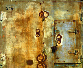 Metal garage doors painted by people as an abstract painting