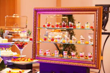 Delicious sweets on candy buffet