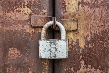 old lock on an iron rusty door. Close up macro