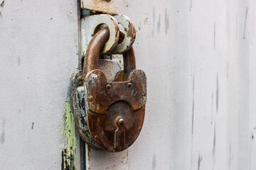 old lock on an iron rusty door. Close up macro