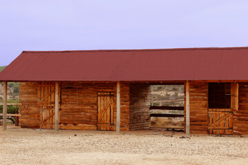 Fototapeta na wymiar a wooden stable in chilean country landscape