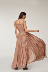 Beautiful woman fashion model makeup brunette hair perfect body shape tanned skin wear clothes...