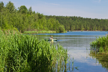 Sunny summer day on lake Volkusha in the Moscow region
