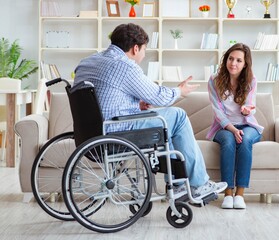 Obraz na płótnie Canvas Desperate disabled person on wheelchair