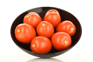 Red plum tomato, macro isolated on a white background.