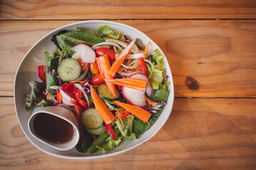 top of salad with crab Stick  on brown wooden table