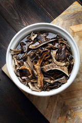 Traditional Siberian food: sundried forest mushrooms soaked before cooking
