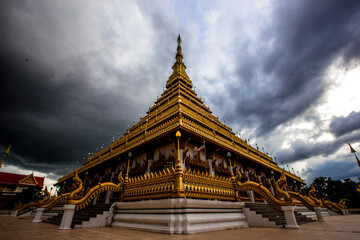 Fototapeta premium Background of the major tourist attractions in Khon Kaen (Phra Mahathat Kaen Nakhon) is a large pagoda with 9 floors, Thai tourists and foreigners come to see the beauty and travel in Thailand always.