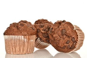 Chocolate muffins, close-up, isolated on a white background.