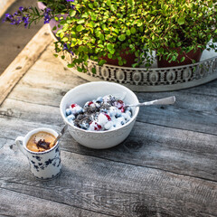 Healthy fresh summer breakfast. Shot in the garden,  top view.