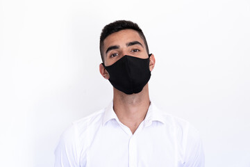 portrait of a young man with a mask in a white background