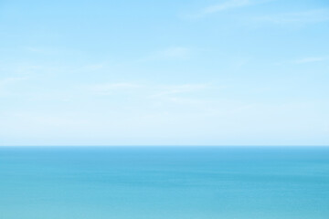 Blue sky over a calm sea in Thailand.