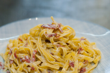 Tasty pasta with cheese and sausage. Traditional italian dish