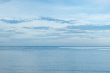 Blue sky over a calm sea in Thailand.