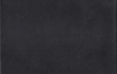 Black leather Background. The rough texture of a black leather.