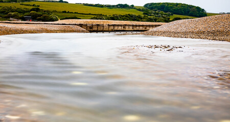River Cuckmere at low tide at Seven Sisters Country Park, East Sussex, England

