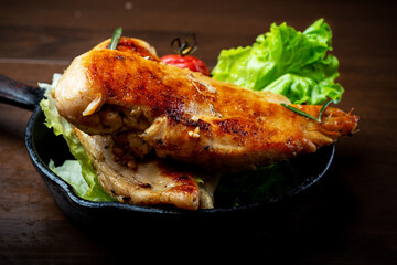 Delicious fried chicken breast and vegetable salad