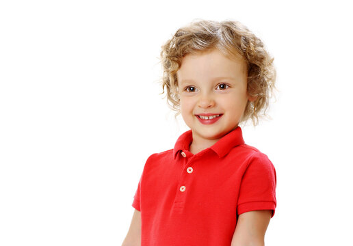 Portrait Of A Cheerful Girl In A Red Polo Shirt With A Smile