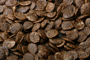 Breakfast cereal balls with chocolate on a white background