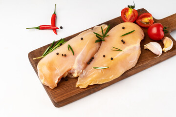 Marinate the fresh chicken breast on the cutting board