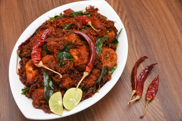 Fried chicken Kebab, Kerala Chicken fry or 65 is hot and spicy crispy chicken dish South India. Non vegetarian starter or quick snack. A popular authentic roasted dish deep fried Indian spices.