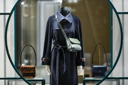 Milan, Italy - January 13, 2020: Purses in a Giorgio Armani showcase at night