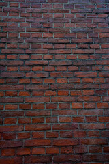A wall made of red bricks.