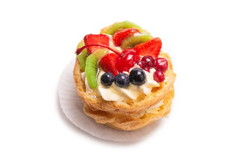 Home made cake with cream and fruits isolated.