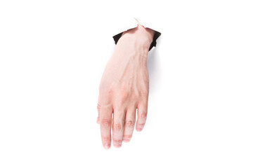 male hand hanging tired through a hole in paper on a white background isolate. close up, copy space.