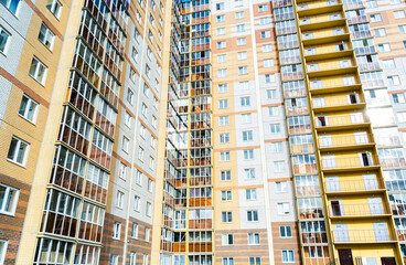 Fototapeta na wymiar Multi-storey residential building. Construction in Russia. Background.