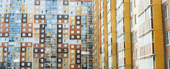 Modern construction in Russia. Multi-storey residential building. Background.