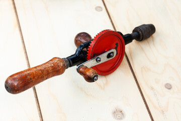 Joinery – old wooden plane, wood polishing tool in a workshop of the carpenter, retro concept.
