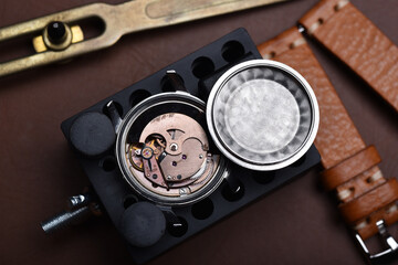 Watch repair, Vintage wrist watch overhaul and service checking mechanical movement by watchmaker.