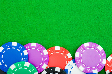 poker chips close up money on a green baize table with copy space