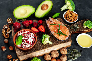 Healthy food selection, healthy eating concept for heart on stone background