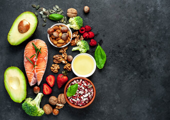 Fototapeta na wymiar Healthy food choice, healthy eating concept for heart on stone background with copy space for your text.