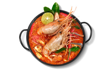 Thai food Tom Yum Kung.Thai hot and spicy soup shrimp in bowl.with Straw Mushroom,lime,Kaffir lime leaves,tomato and chilli. Splash on the air. isolated on white background.