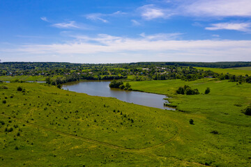 A lake on the edge of a typical European village.