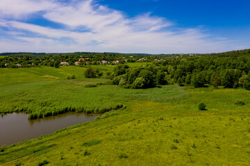 Fototapeta premium A lake on the edge of a typical European village.