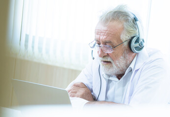 Doctor making online video conference to give advice to patient