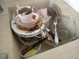 dirty dishes in the sink, Kitchen dirty mess washing-up