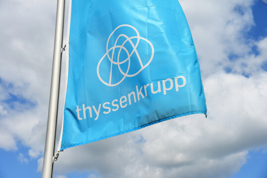 Hanover, Lower Saxony / Germany - May 5, 2019: Flag with the logo of ThyssenKrupp in Hanover, Germany - ThyssenKrupp AG is one of the world's largest steel producers