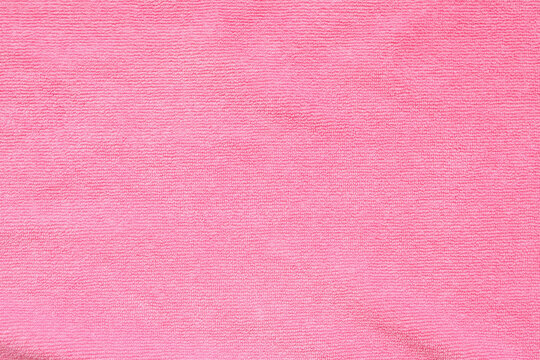 Pink towel fabric texture surface close up background