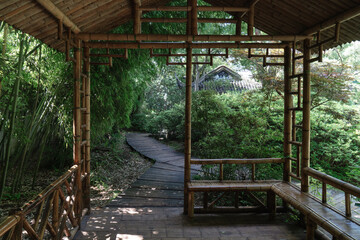 Ancient bamboo cabin and the path, Suzhou garden, in China.