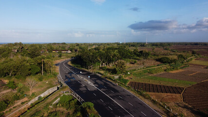 Fototapeta na wymiar aerial view of the highway with beautiful views. the southern Java crossing line